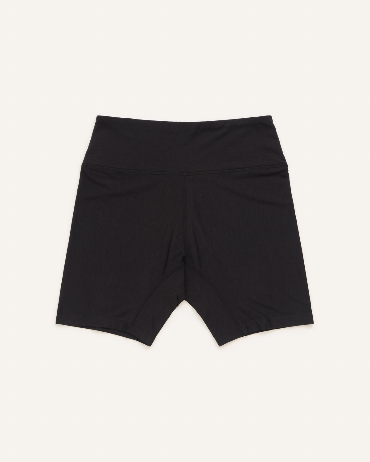 Laydown of Roam Bike Short in Black. Roam Bike Short is a merino wool short with pockets available in sizes XS-3X.