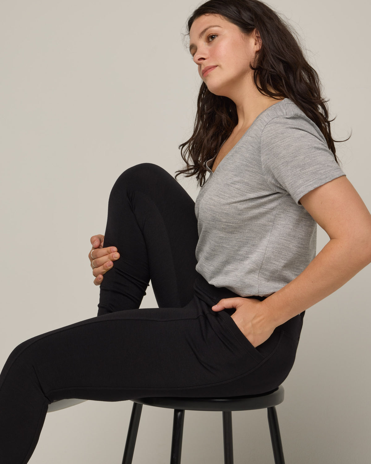 Model wearing Terra Ponte Legging in Black. Terra Ponte Legging is a merino wool legging with pockets available in sizes XS-3X Regular, S-XXL Long.