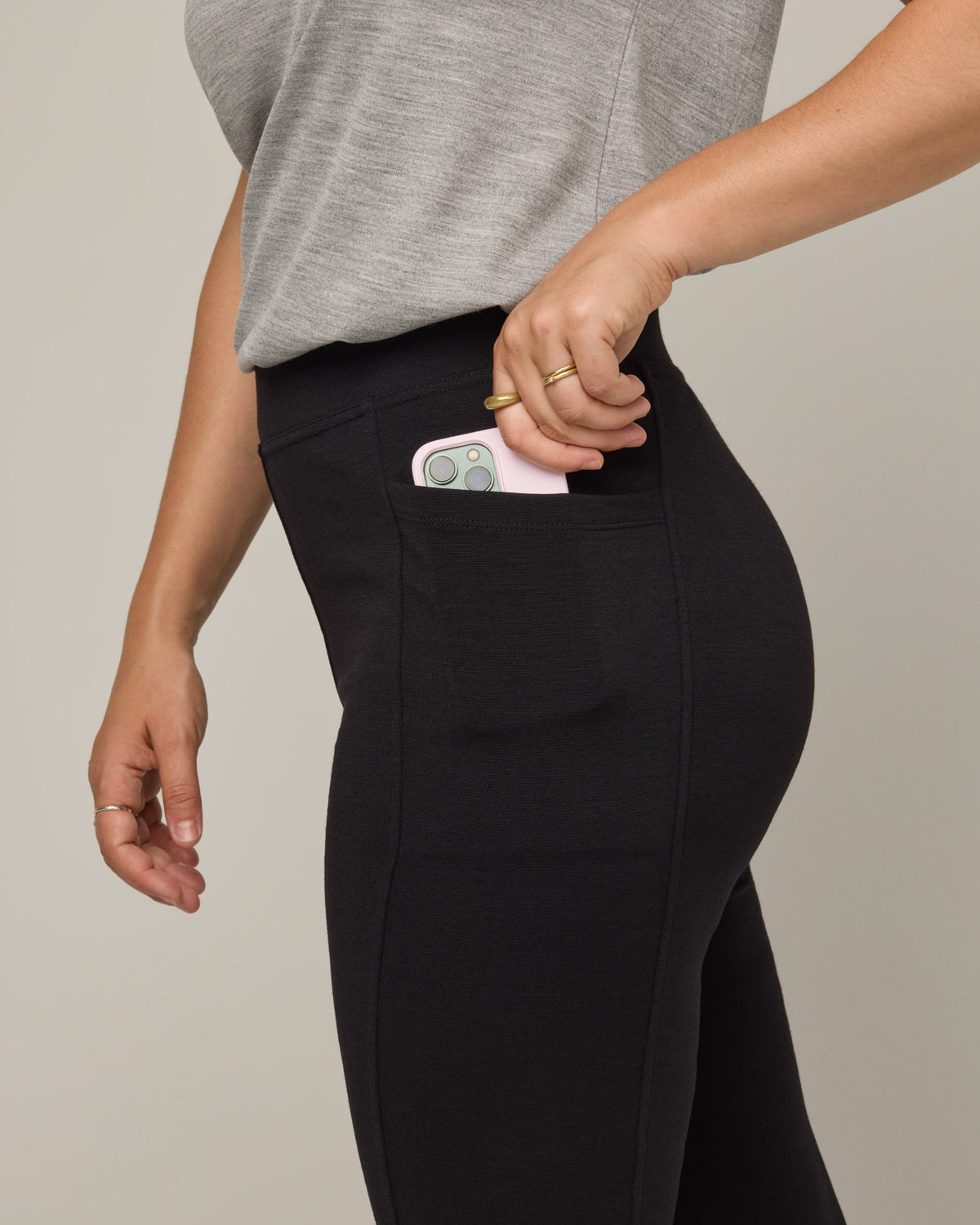 Model wearing Terra Ponte Legging in Black. Terra Ponte Legging is a merino wool legging with pockets available in sizes XS-3X Regular, S-XXL Long.