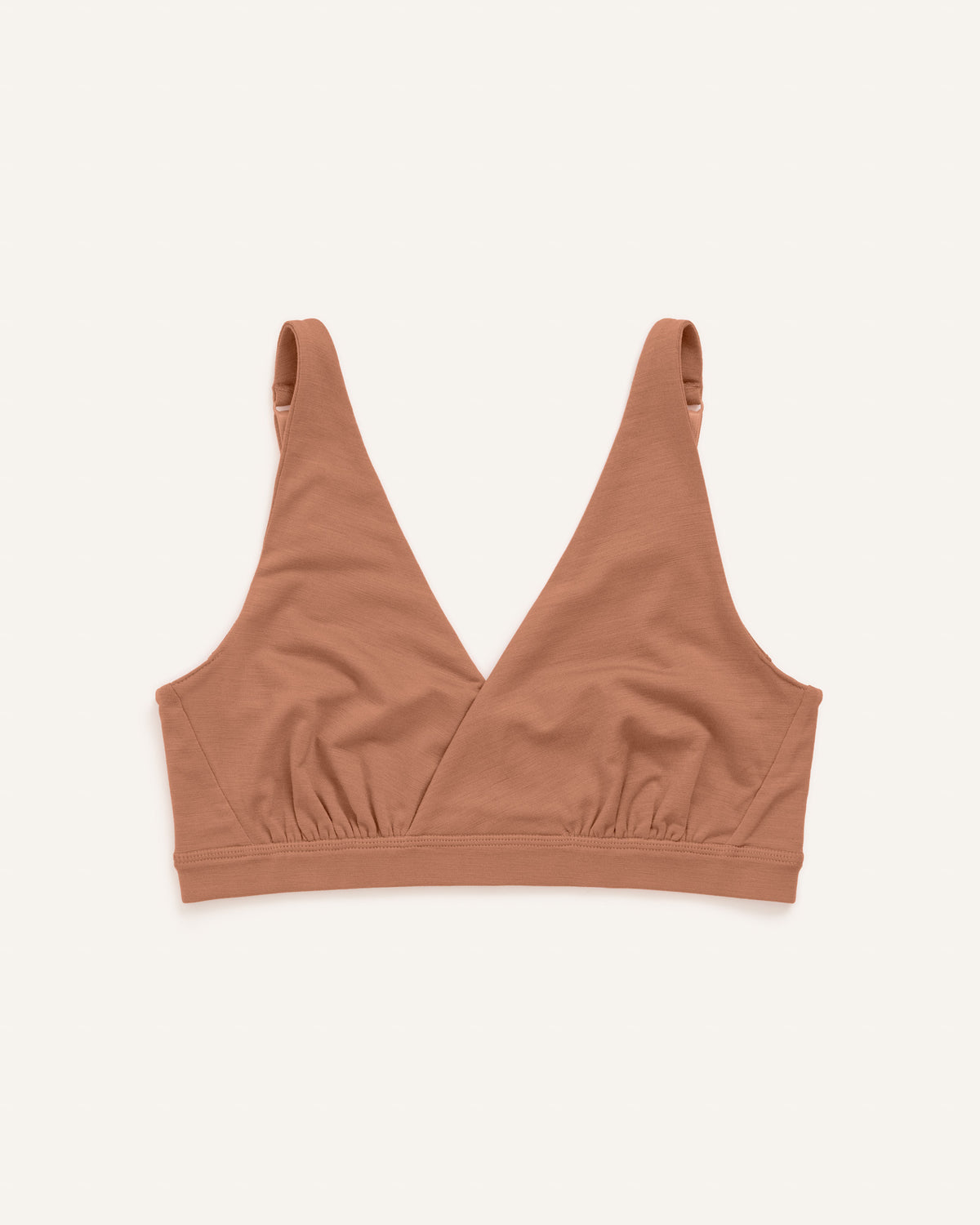 Laydown of Roam Convertible Wrap Bra in Mocha Brown, a medium-dark nude color. Roam Convertible Wrap Bra is a merino wool underwear available in sizes XS-XXL.