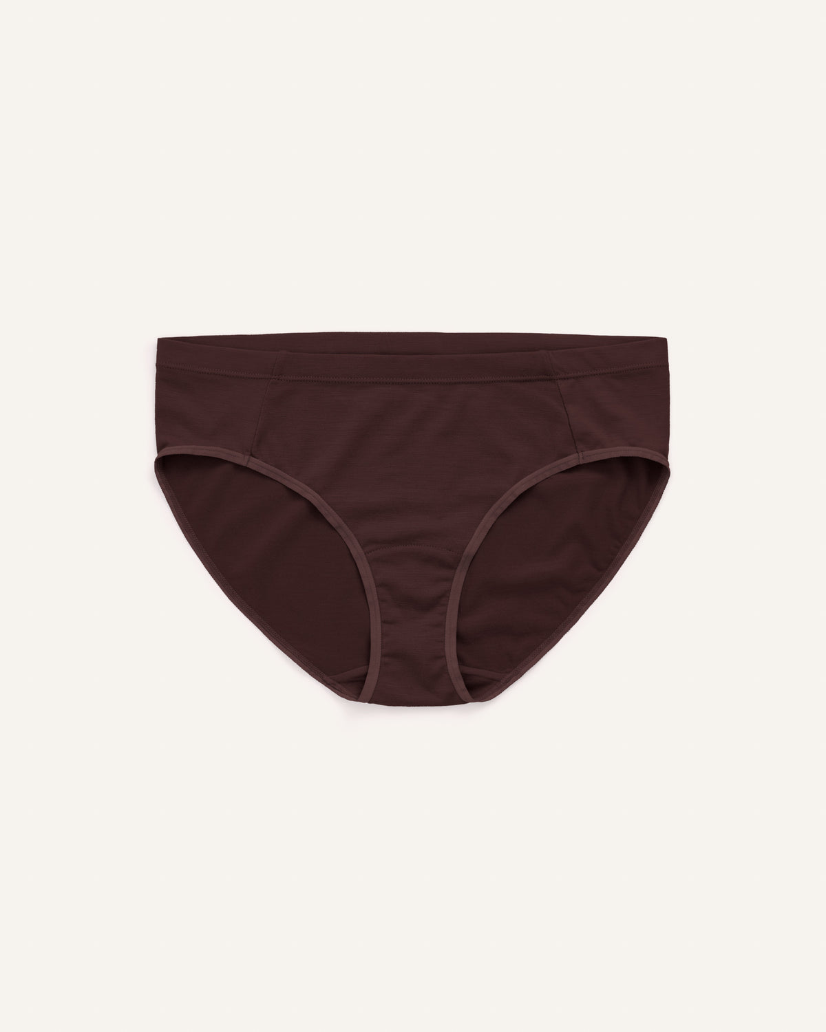 Laydown of Roam Bikini in Espresso, a dark brown color. Roam Bikini is a merino wool underwear available in sizes XS-3X.