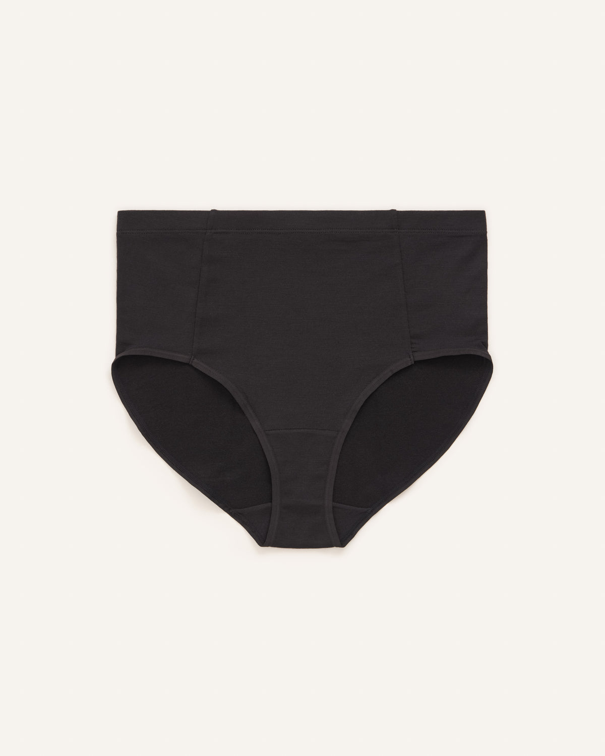 Model wearing Roam High Waist Bikini in Black. Roam High Waist Bikini is a merino wool underwear available in sizes XS-3X.