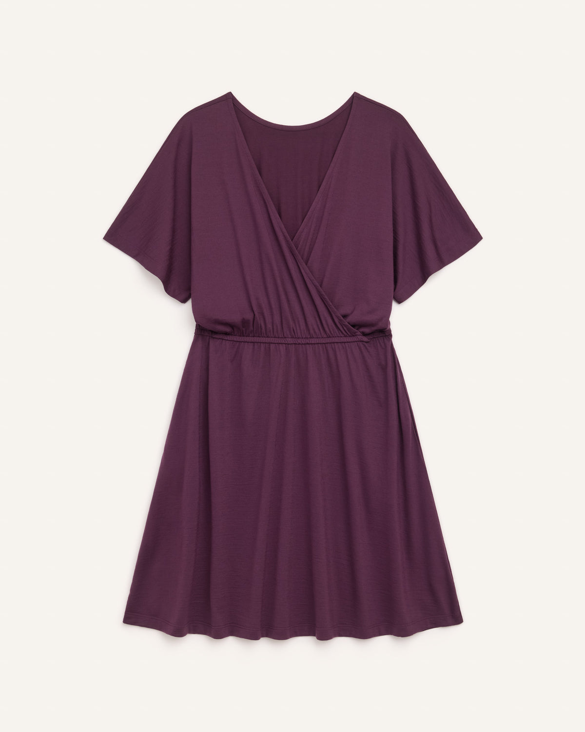 Laydown of Brooklyn Reversible Dress in Marionberry, a dark berry purple color. Brooklyn Reversible Dress is a merino wool short sleeve, reversible, knee length fit & flare dress with pockets available in sizes XS-3X Regular, XS-XL Long.