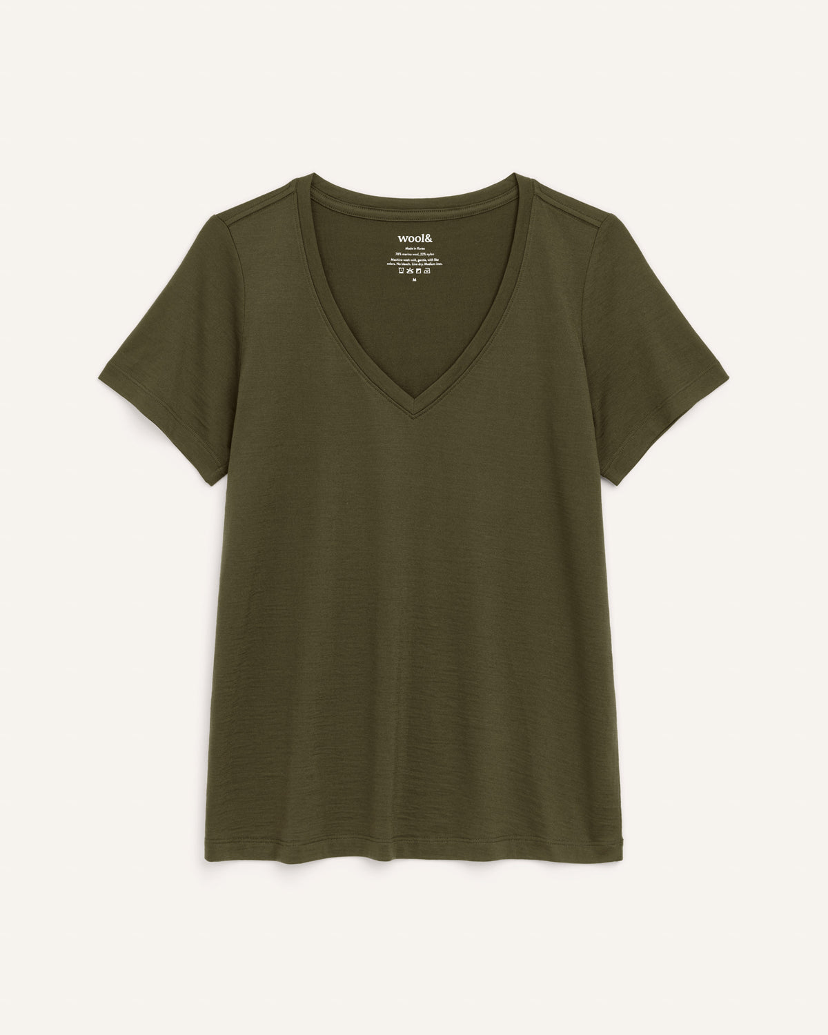 Laydown of Morgan V-Neck Tee in Forest Night, a muted dark green color. Morgan V-Neck Tee is a merino wool short sleeve, v-neck, regular fit tee available in sizes XS-3X.
