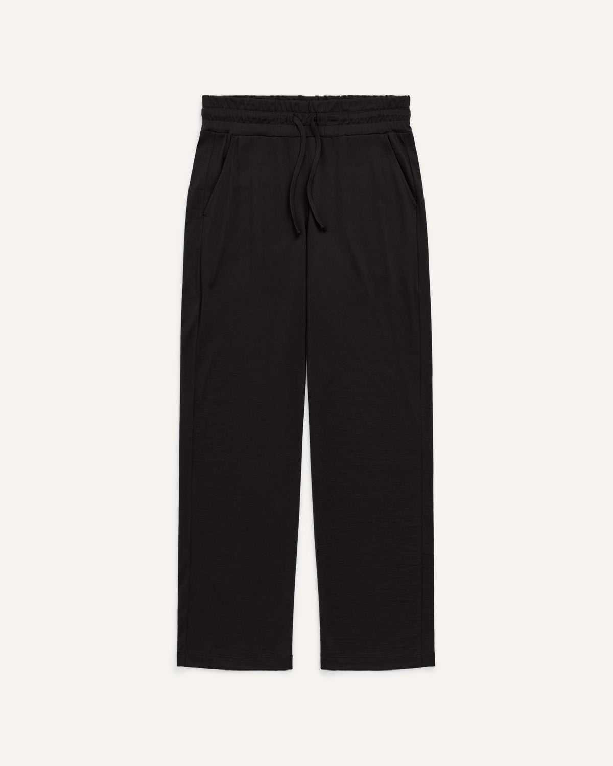 Laydown of Twilight Sleep Pant in Black. Twilight Sleep Pant is a merino wool pant with pockets available in sizes XS-XXL.