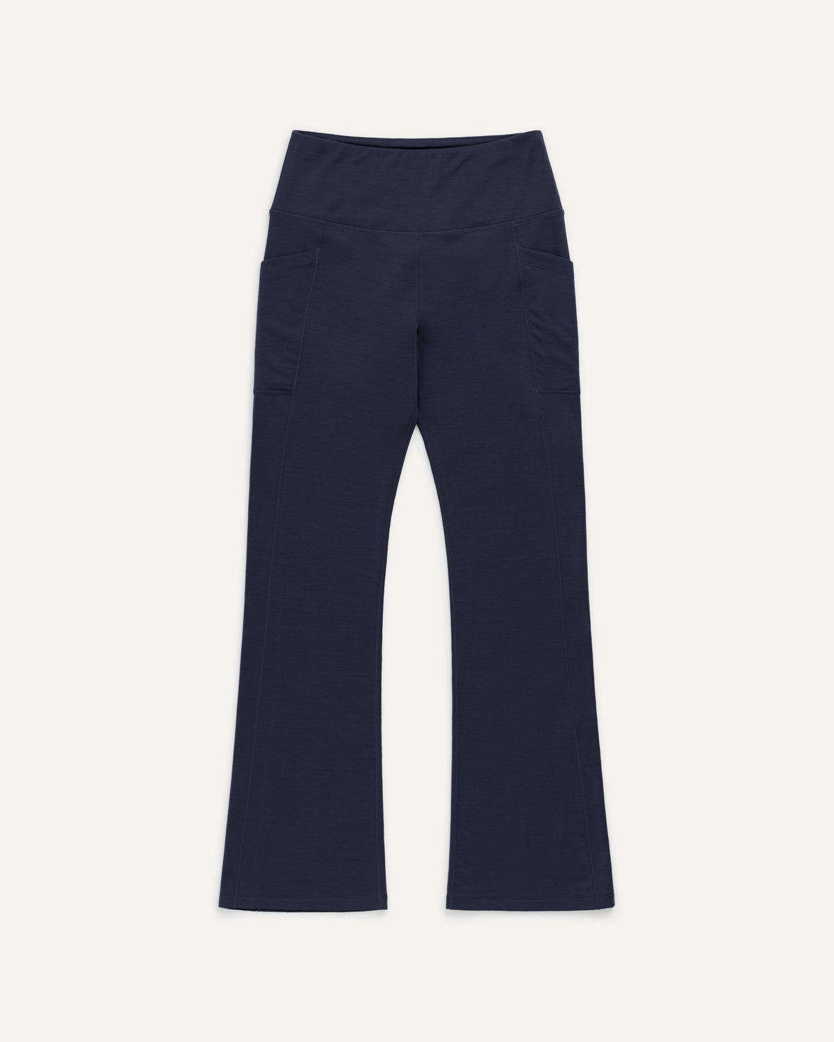 Laydown of Summit Straight Cut Pocket Legging in Navy. Summit Straight Cut Pocket Legging is a merino wool legging with pockets available in sizes XS-3X Regular, S-XXL Long.