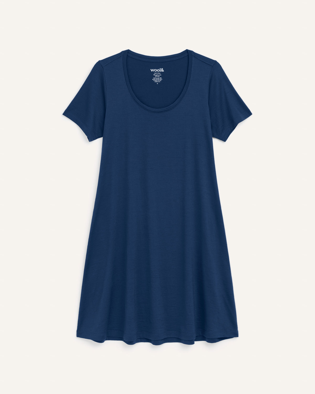 Laydown of Maggie Swing Dress in Marine Blue, a deep royal blue color. Maggie Swing Dress is a merino wool short sleeve, scoop neck, knee length swing dress with pockets available in sizes XS-3X Regular, XS-3X Long.