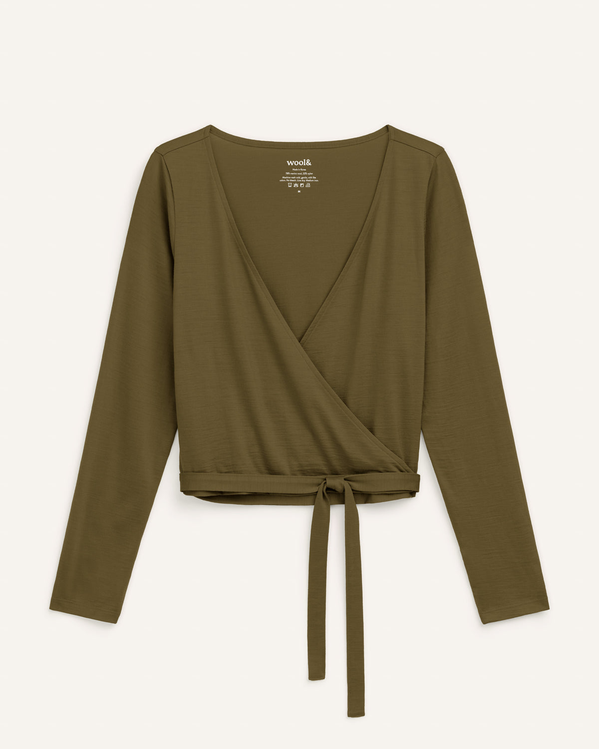 Laydown of Natalia Wrap Top in Olive. Natalia Wrap Top is a merino wool long sleeve, v-neck, slim fit top available in sizes XS-3X.