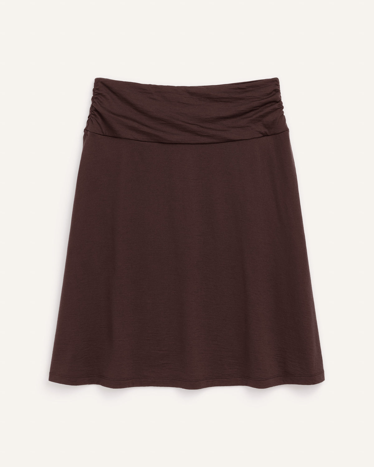 Laydown of Helena Skirt in Espresso, a dark brown color. Helena Skirt is a merino wool knee length skirt with pockets available in sizes XS-3X.