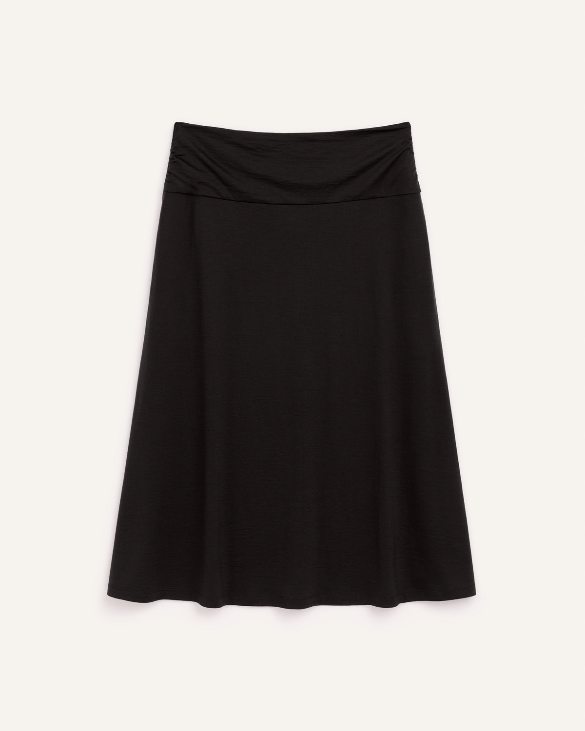 Laydown of Helena Midi Skirt in Black. Helena Midi Skirt is a merino wool midi skirt with pockets available in sizes XS-3X.