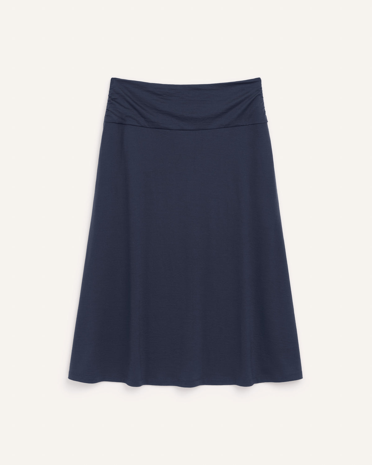 Laydown of Helena Midi Skirt in Washed Navy. Helena Midi Skirt is a merino wool midi skirt with pockets available in sizes XS-3X.