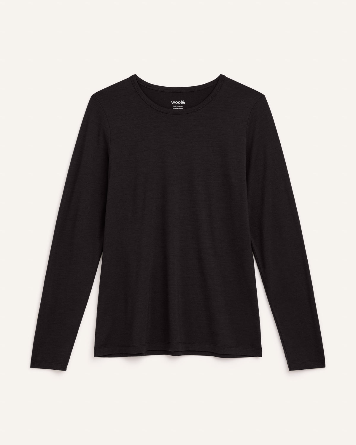 Laydown of Sloan 100% Wool Fitted Tee in Black. Sloan 100% Wool Fitted Tee is a merino wool long sleeve, crew neck, slim fit tee available in sizes XS-3X.