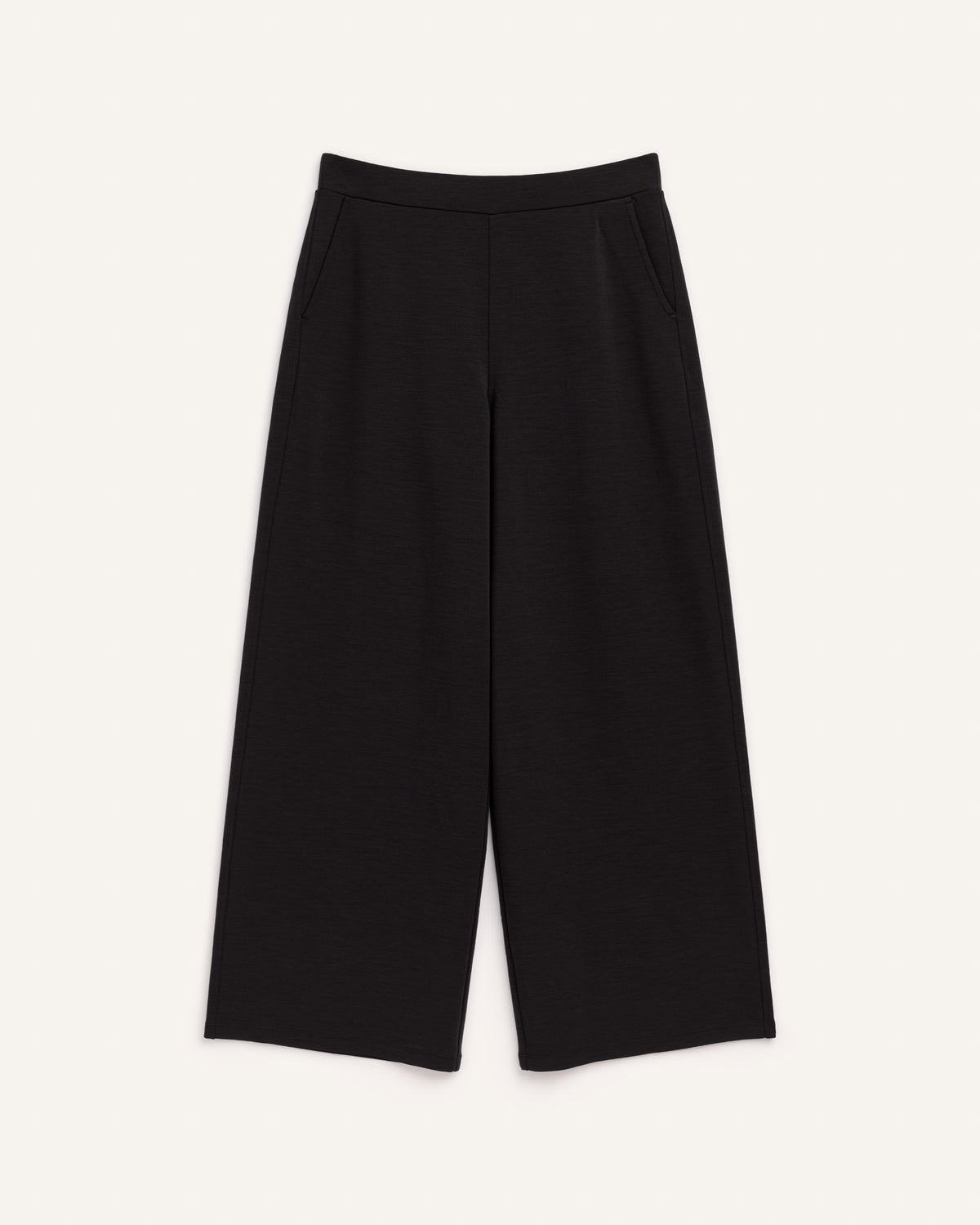 Laydown of Lane Wide Leg Ponte Pant in Black. Lane Wide Leg Ponte Pant is a merino wool pant with pockets available in sizes XS-3X Regular, XS-XXL Long.