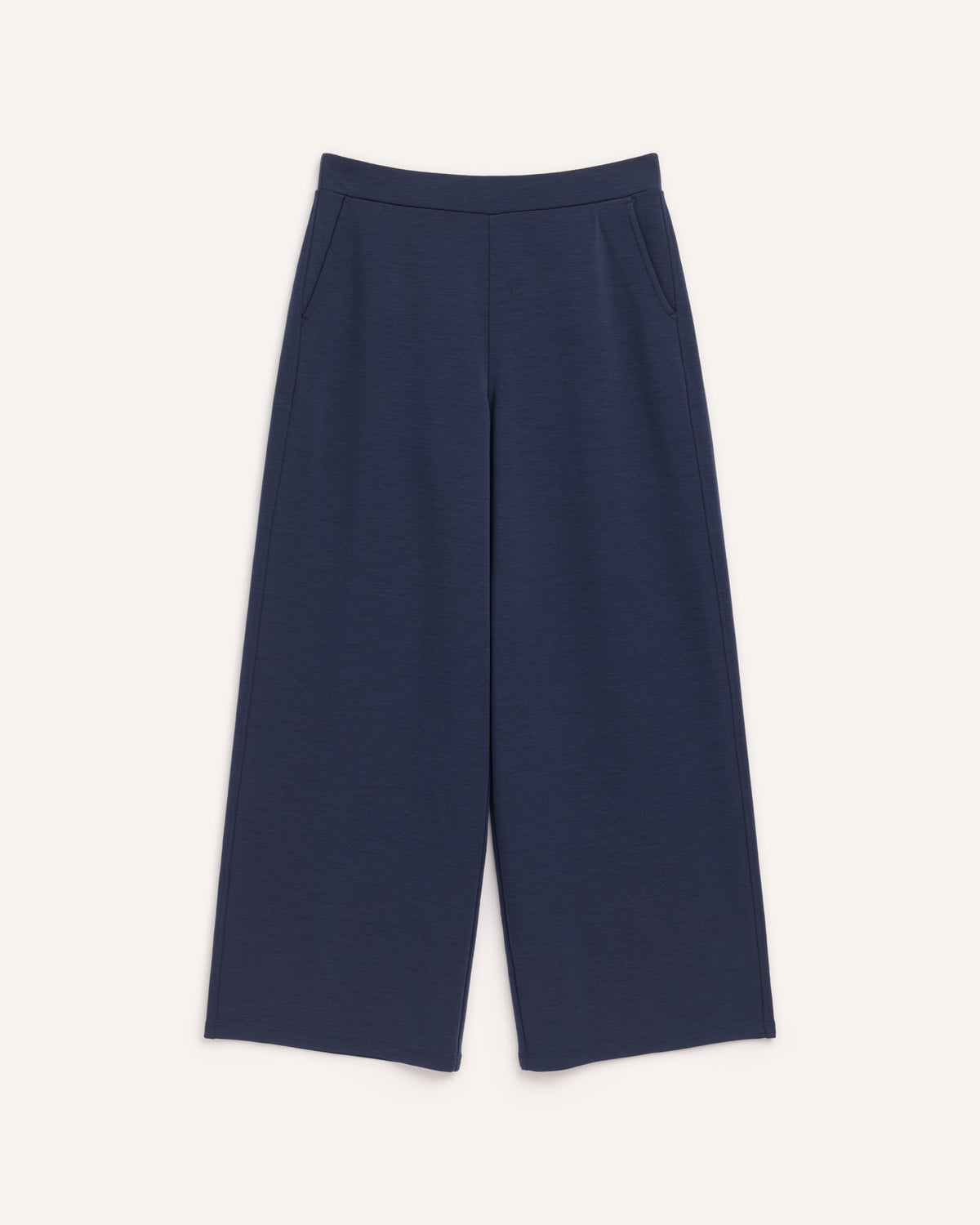 Laydown of Lane Wide Leg Ponte Pant in Washed Navy. Lane Wide Leg Ponte Pant is a merino wool pant with pockets available in sizes XS-3X Regular, XS-XXL Long.