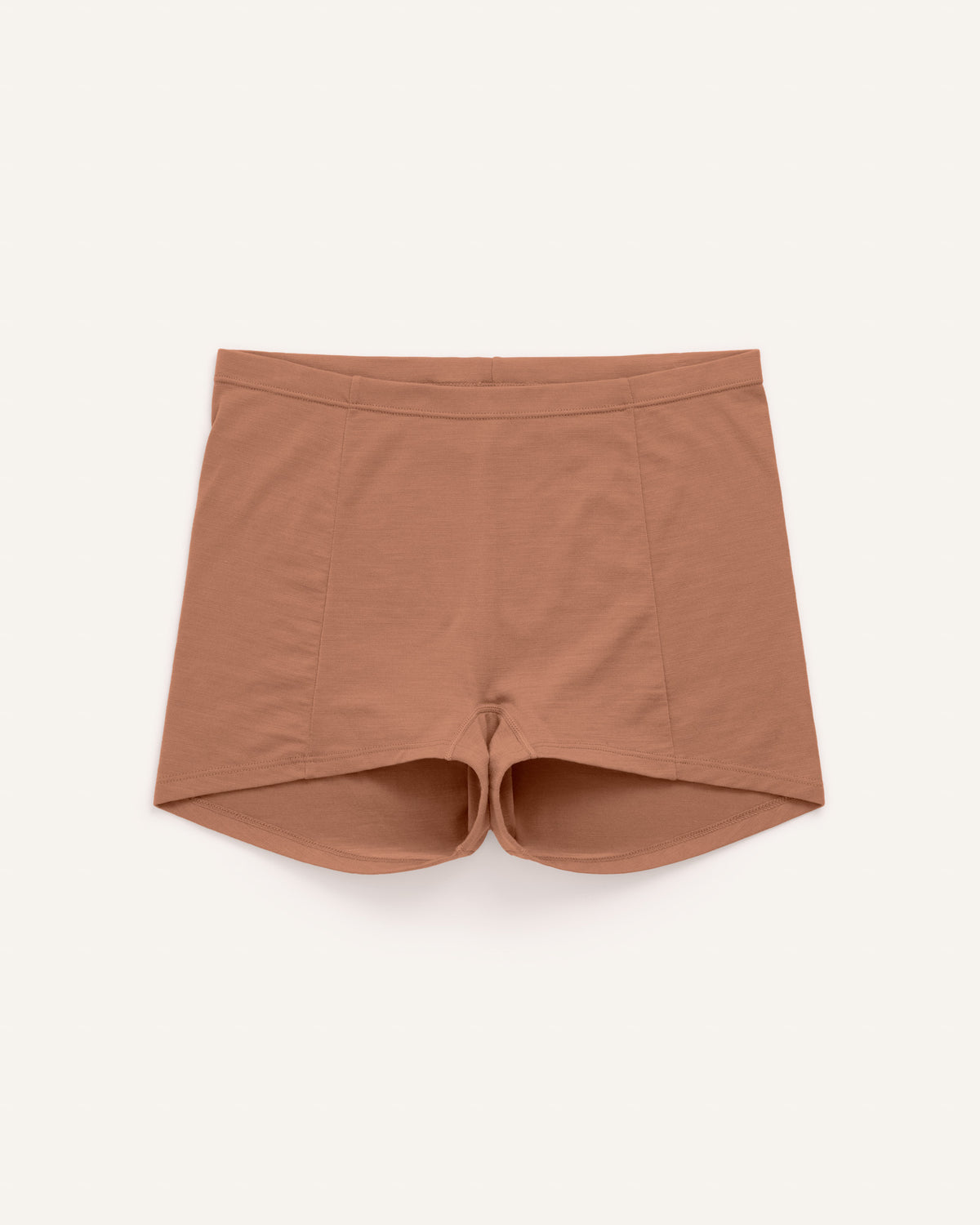 Laydown of Roam High Waist Shortie in Mocha Brown, a medium-dark nude color. Roam High Waist Shortie is a merino wool underwear available in sizes XS-3X.