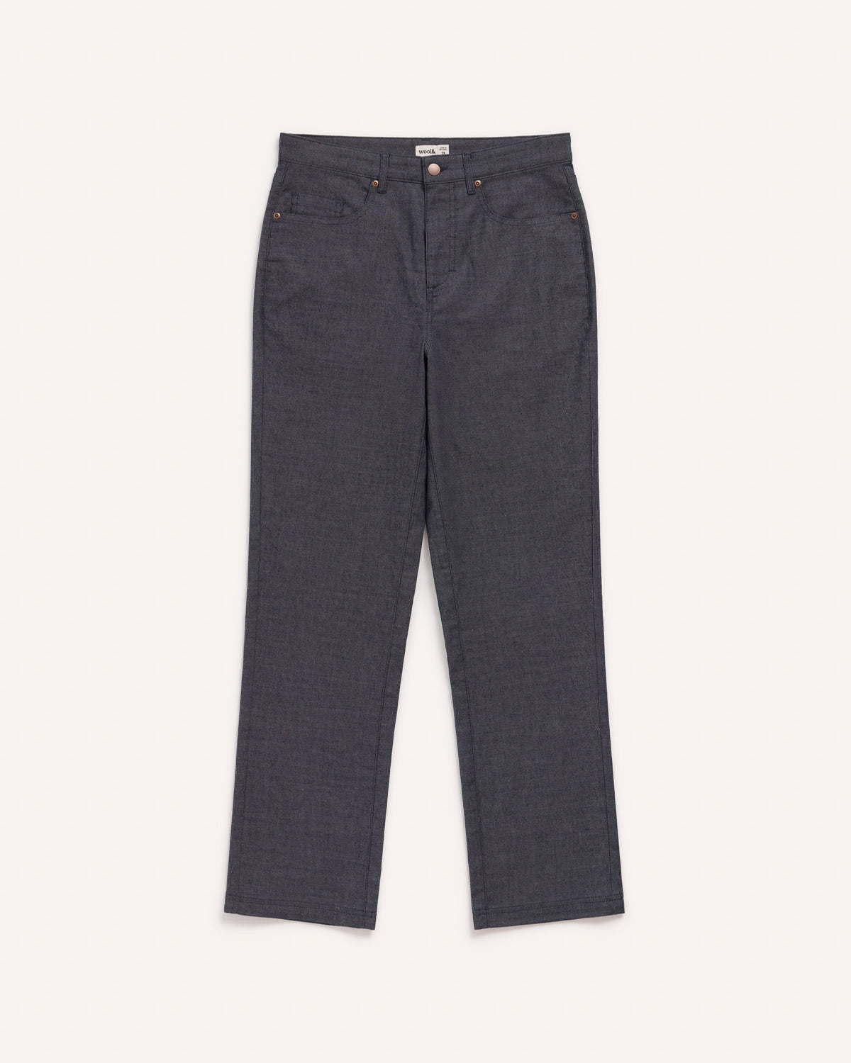 Model wearing Hawthorne Straight Leg Denim Jean in Indigo Blue. Hawthorne Straight Leg Denim Jean is a merino wool pant with pockets available in sizes 26-34.