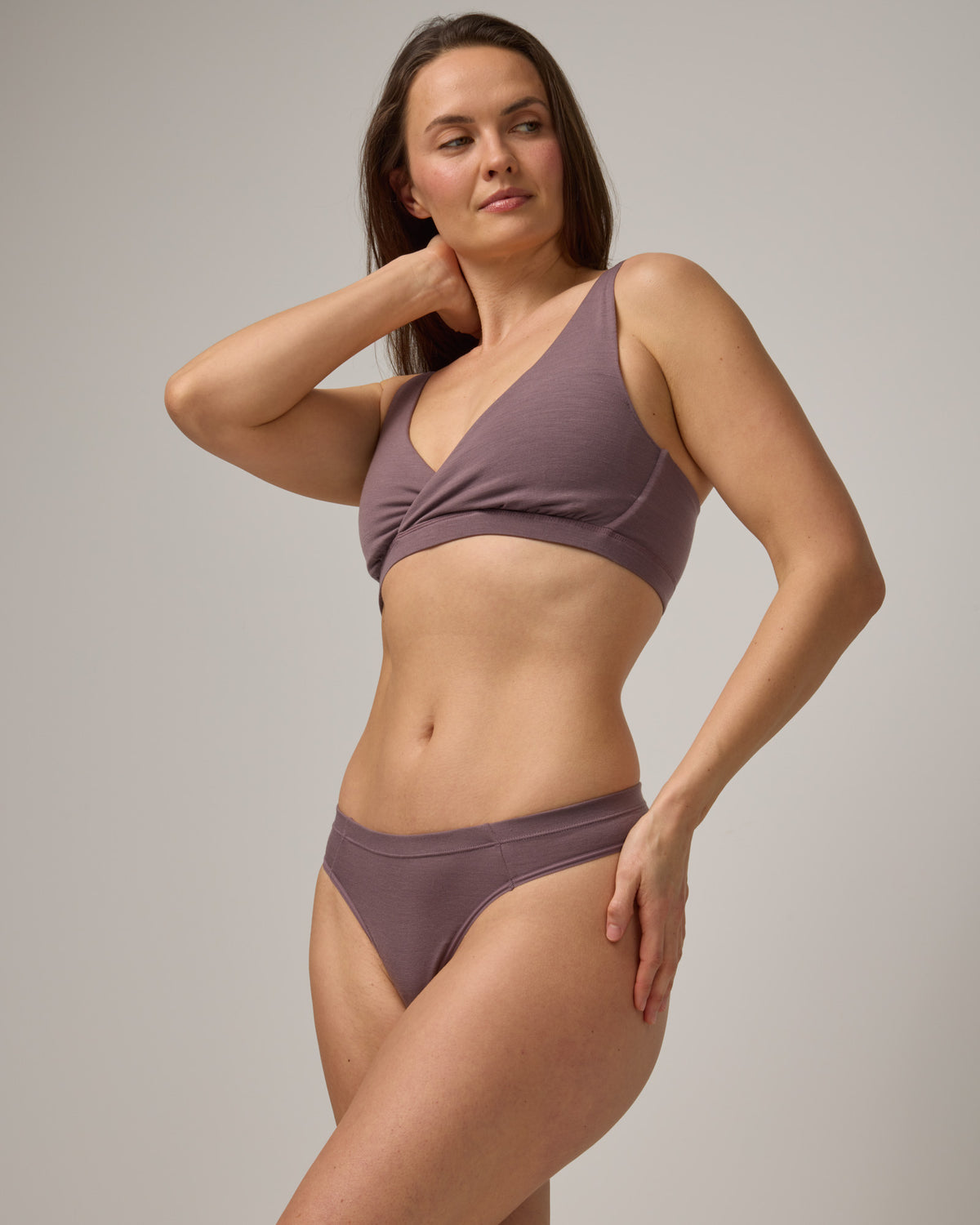 Model wearing Roam Thong in Lavender, a dusky muted purple color. Roam Thong is a merino wool underwear available in sizes XS-3X.
