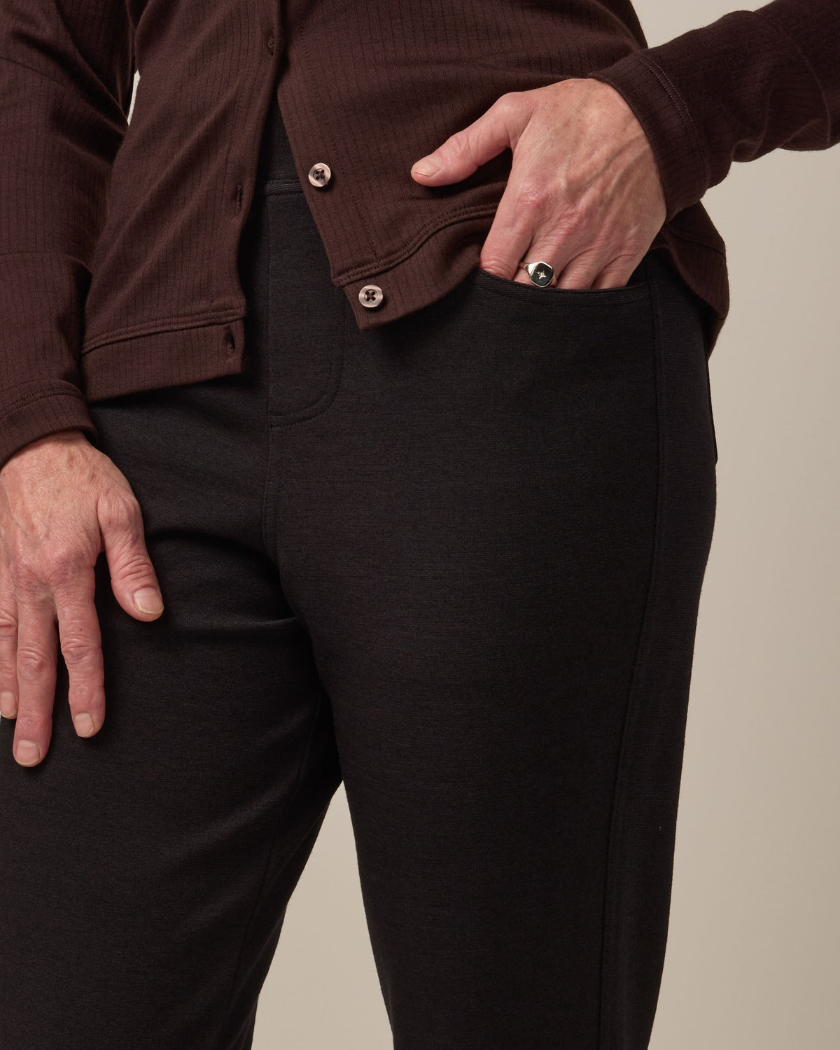 Model wearing Foster Kick Flare Ponte Pant in Black. Foster Kick Flare Ponte Pant is a merino wool flare pant available in sizes S-3X Regular, S-XL Long, and XS-XL Petite.