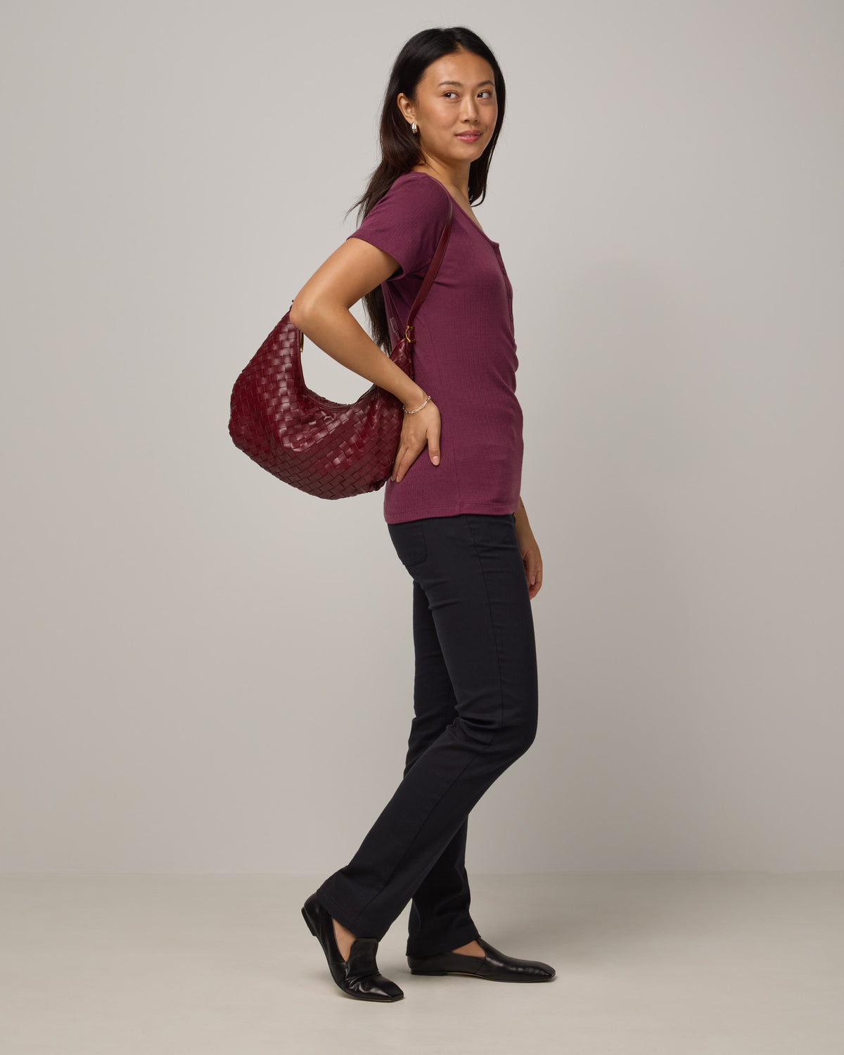 Model wearing Hawthorne Straight Leg Denim Jean in Black. Hawthorne Straight Leg Denim Jean is a merino wool jean available in sizes 26-34.