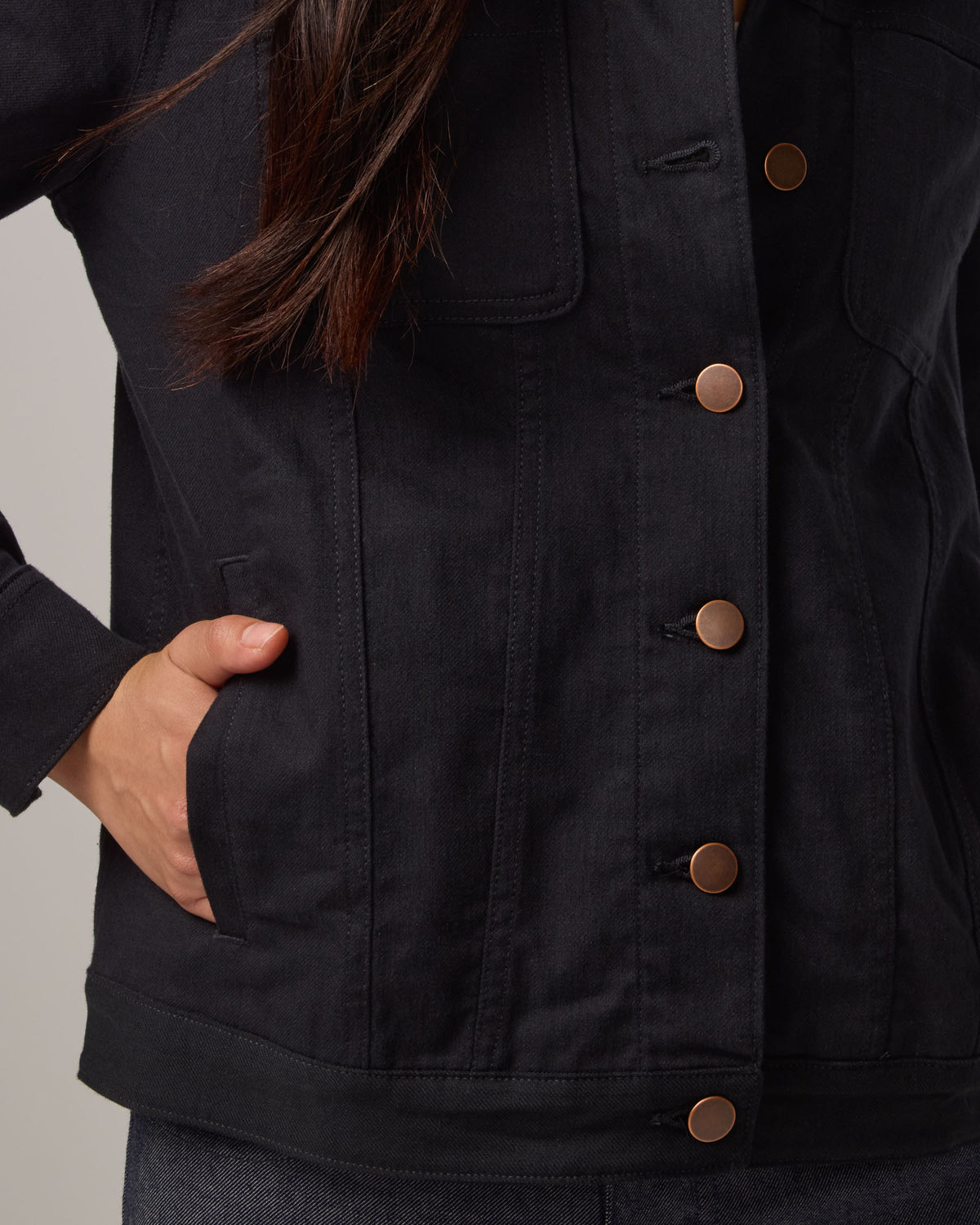 Model wearing Logan Denim Jacket in Black. Logan Denim Jacket is a merino wool classic long sleeve, collared denim jacket available in sizes XS-XXL.
